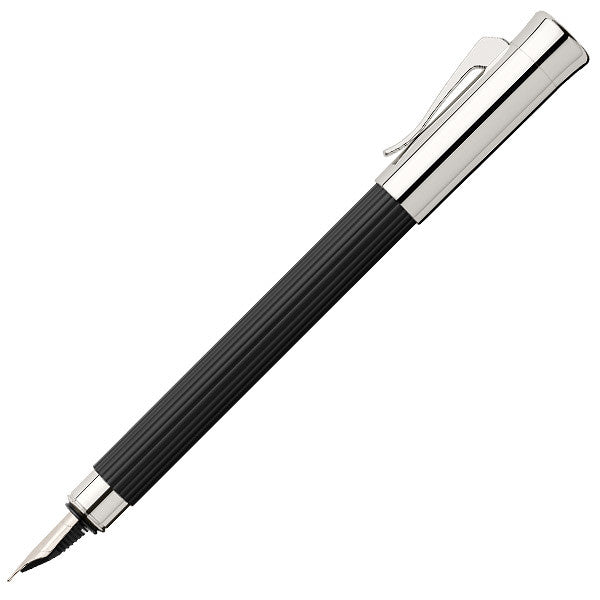 A slim fluted metal fountain pen with a polished black finish.